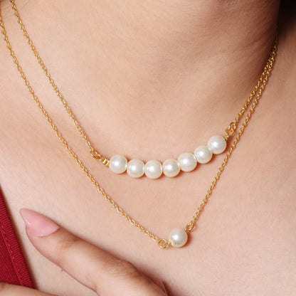 Layered Seven-Pearl & Single-Pearl Necklace
